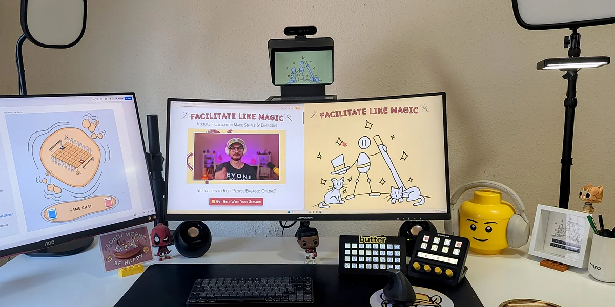 the Facilitainer Facilitation Tech Setup - Virtual Facilitation Facilitation tech desk setup with monitors, lights, microphone, and Stream Deck for online workshops and training